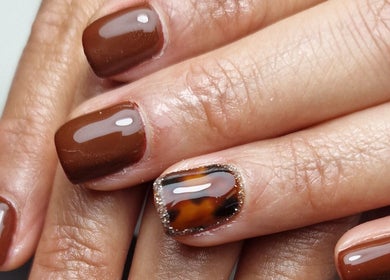 Stylish brown gel manicure with accent nail at Gels By Kana, Walsall, England, GB.