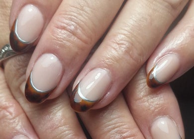 Stylish nail design at Gels By Kana, Walsall, England, GB showcasing chic nail art.