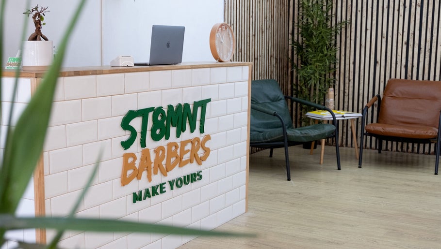 ST8MNT Barbers reception with sleek decor in Gibraltar, GI.