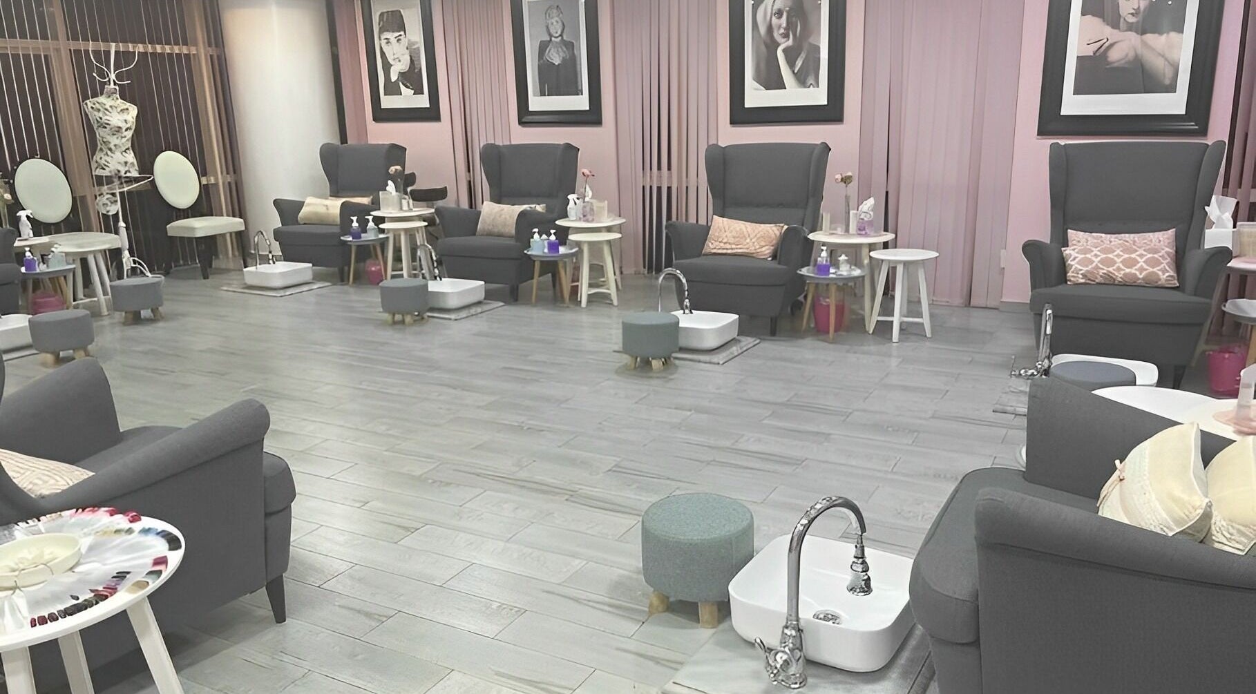 Elegant nail salon interior at Sugarcoat Nails, Abu Dhabi, AE with plush chairs and stylish decor.