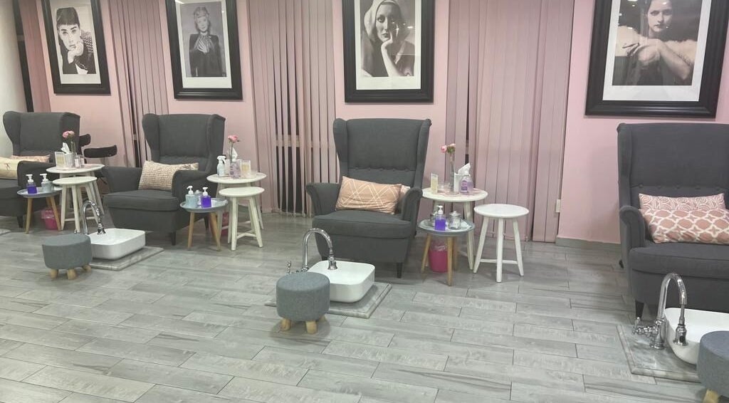 Elegant spa chairs at Sugarcoat Nails in Abu Dhabi, AE, offering top-tier nail services.