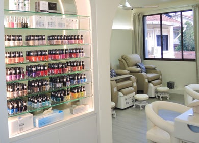 Stylish nail polish display and cozy pedicure chairs at Elene Beauty Upper Thomson, Singapore, Singapore, SG.