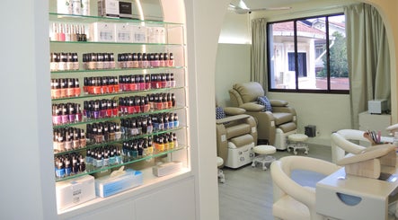 Stylish nail polish display and cozy pedicure chairs at Elene Beauty Upper Thomson, Singapore, Singapore, SG.
