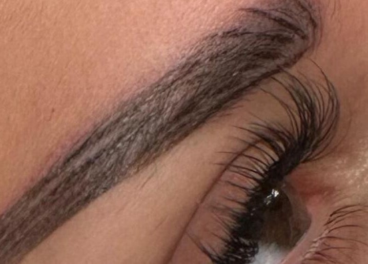 Expert eyebrow styling at Salon & Yello Spa in Riyadh, Riyadh Province, SA, showcasing precise grooming.