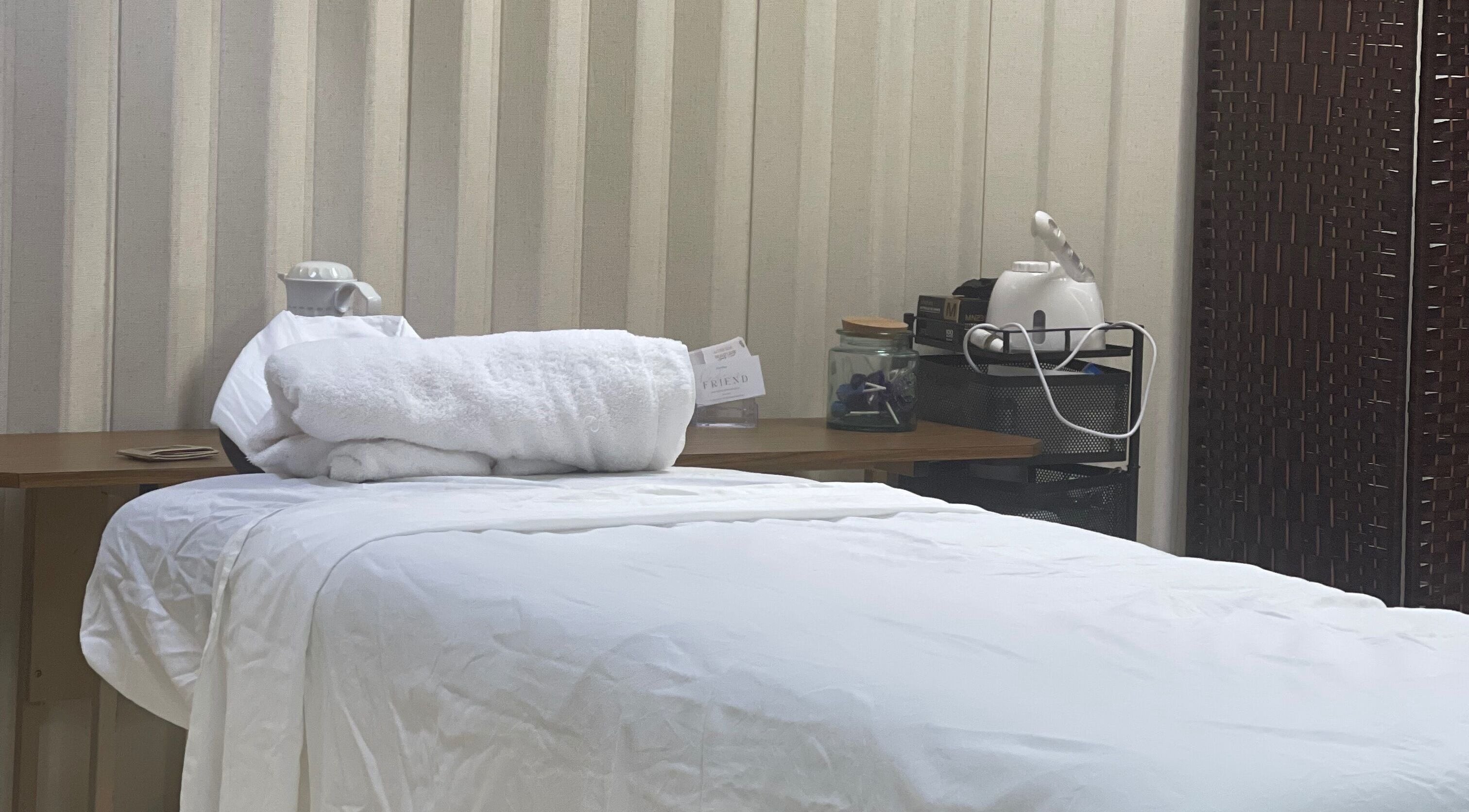 Relaxing spa room at AzureRae in Bridgetown, Saint Michael, BB, featuring a cozy treatment bed.