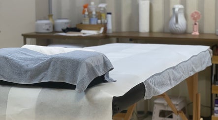 Massage table setup at AzureRae, Bridgetown, Saint Michael, BB, offering a soothing spa experience.