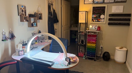 Cozy nail studio at Enchanted Nails in Kelowna, British Columbia, CA with a colorful and inviting setup.