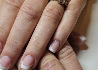 Close-up of elegant French manicure at Enchanted Nails, Kelowna, British Columbia, CA.
