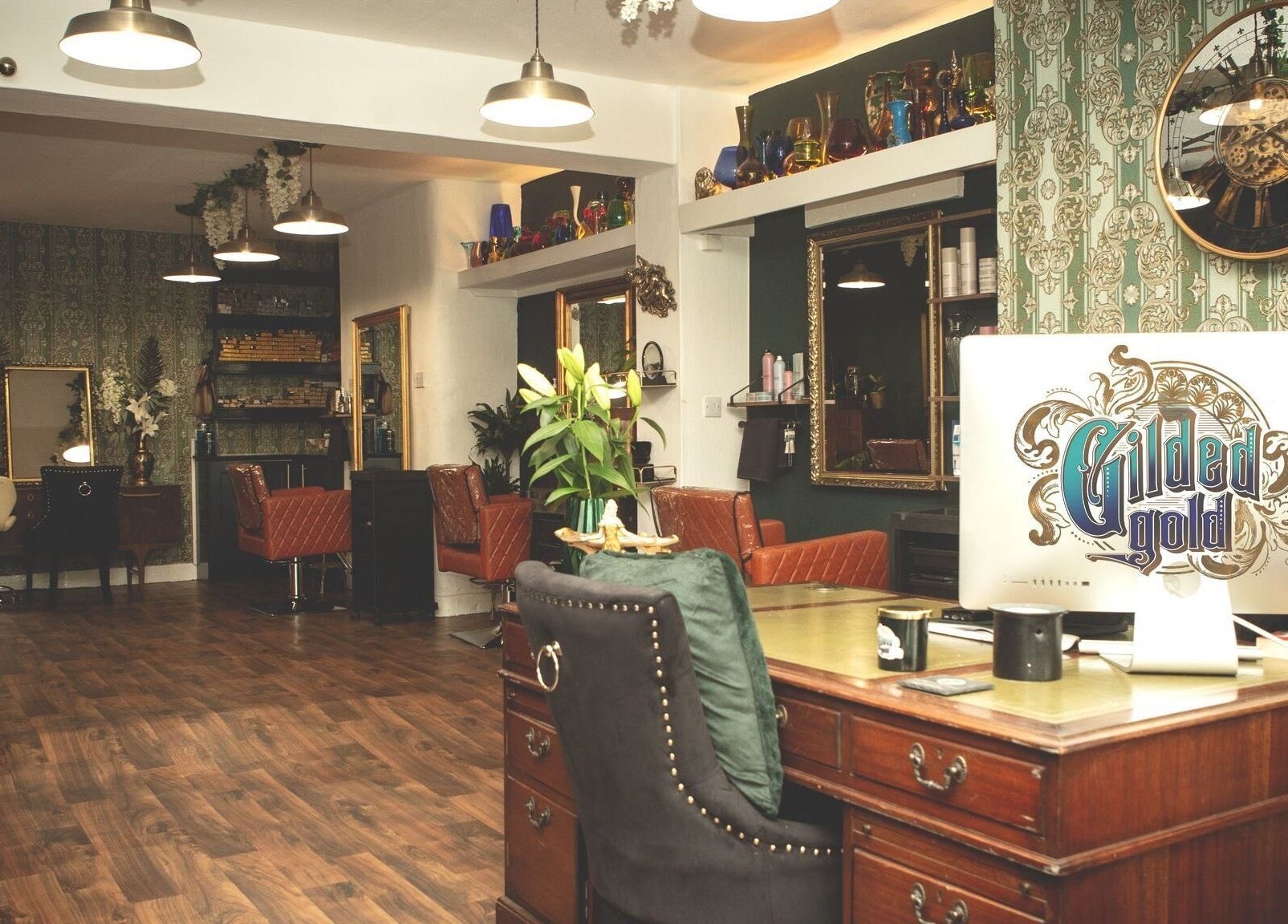 Chic interior of Gilded Gold Design House in Carlisle, England, GB with elegant decor and luxurious seating.