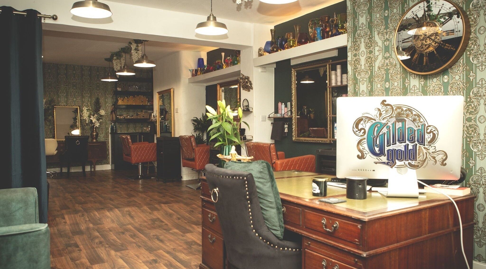 Chic interior of Gilded Gold Design House in Carlisle, England, GB with elegant decor and luxurious seating.