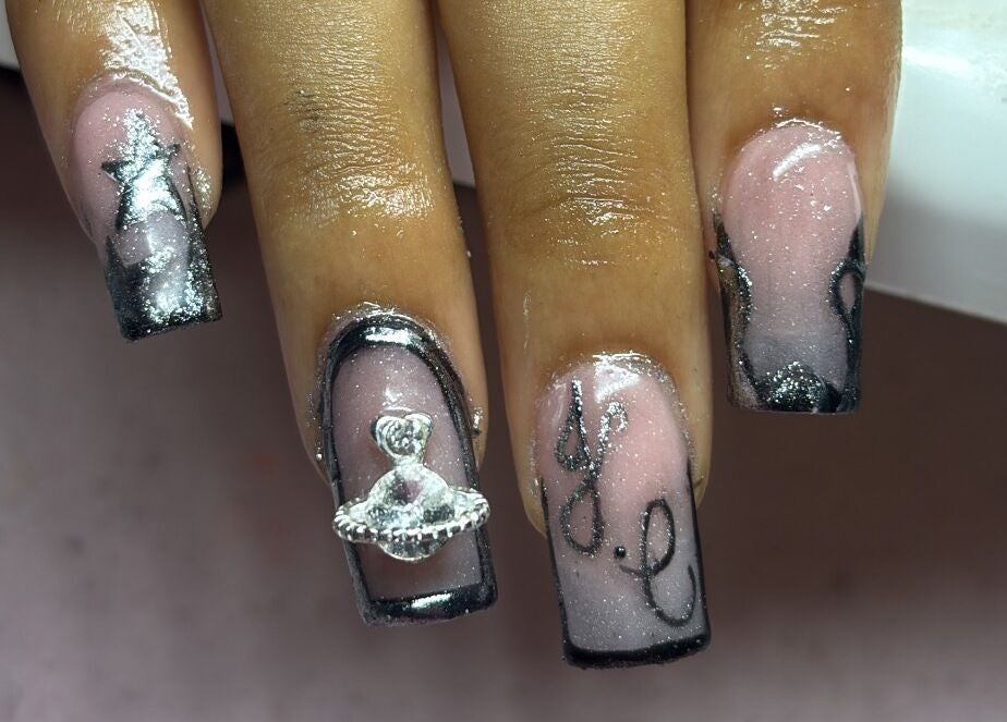 Intricate galactic nail art at SquaredByT, Cole Bay, Sint Maarten, SX.