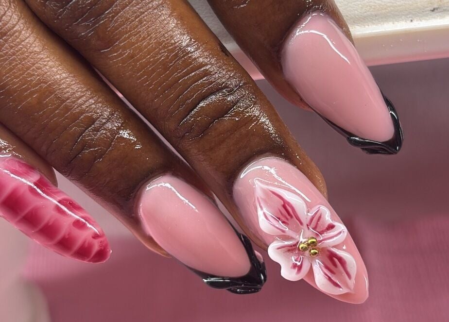 Elegant nail art with floral designs at SquaredByT, Cole Bay, Sint Maarten, SX.
