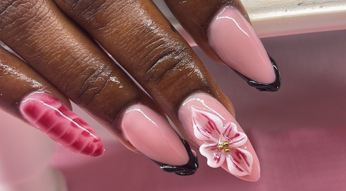Elegant nail art with floral designs at SquaredByT, Cole Bay, Sint Maarten, SX.