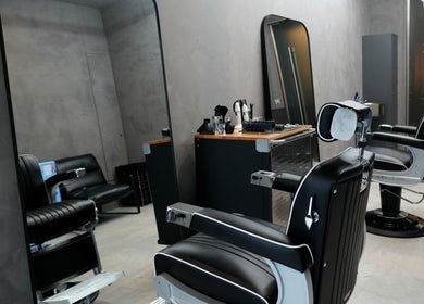 ZERO81 Hair Studio - Liverpool Street interior with stylish barber chairs, London, England, GB.