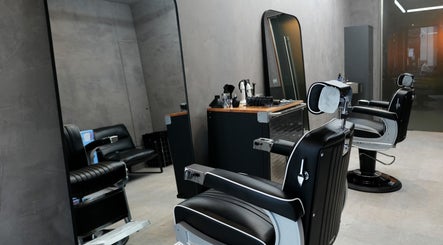 ZERO81 Hair Studio - Liverpool Street interior with stylish barber chairs, London, England, GB.