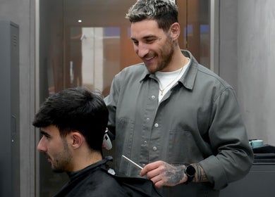 Stylist working on client at ZERO81 Hair Studio - Liverpool Street, London, England, GB.