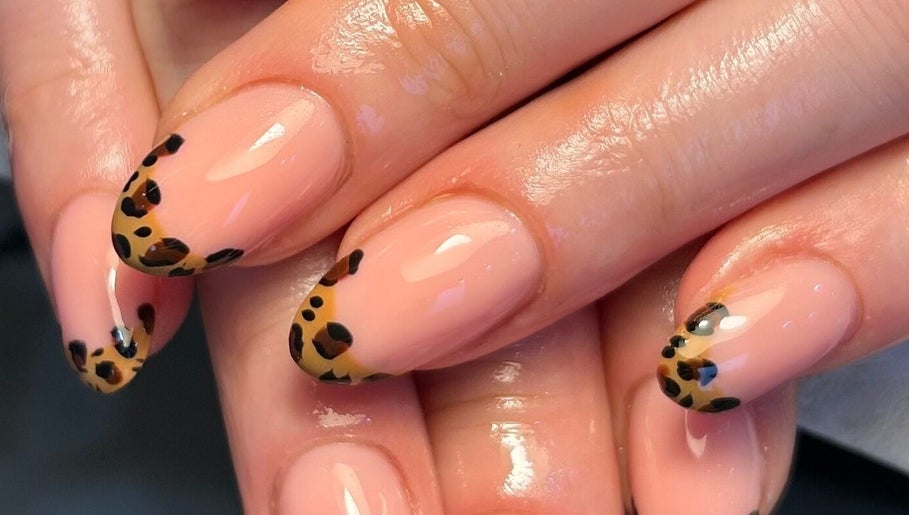Elegant leopard print nails by By Paige in Urmston, England, GB. Perfect manicure close-up.