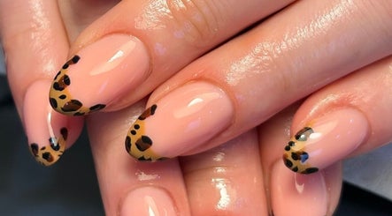 Elegant leopard print nails by By Paige in Urmston, England, GB. Perfect manicure close-up.