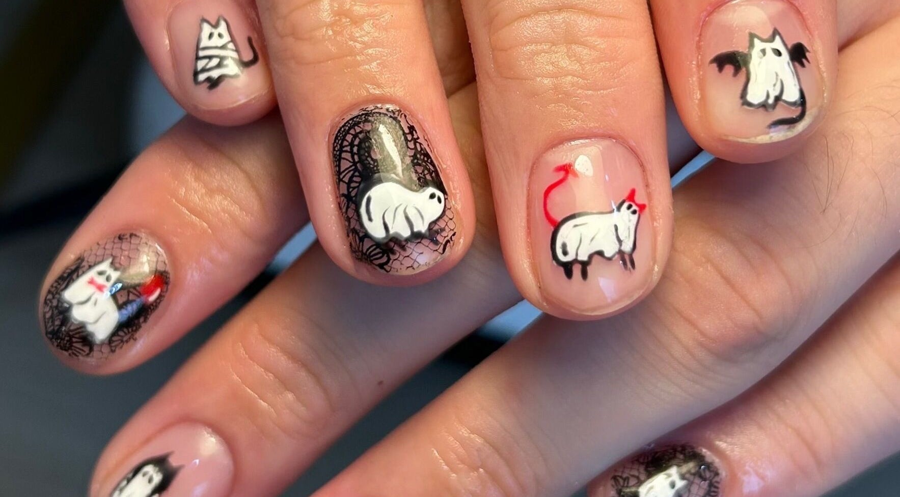 Unique ghost-themed nail art at By Paige, Urmston, England, GB, showcasing creative designs.