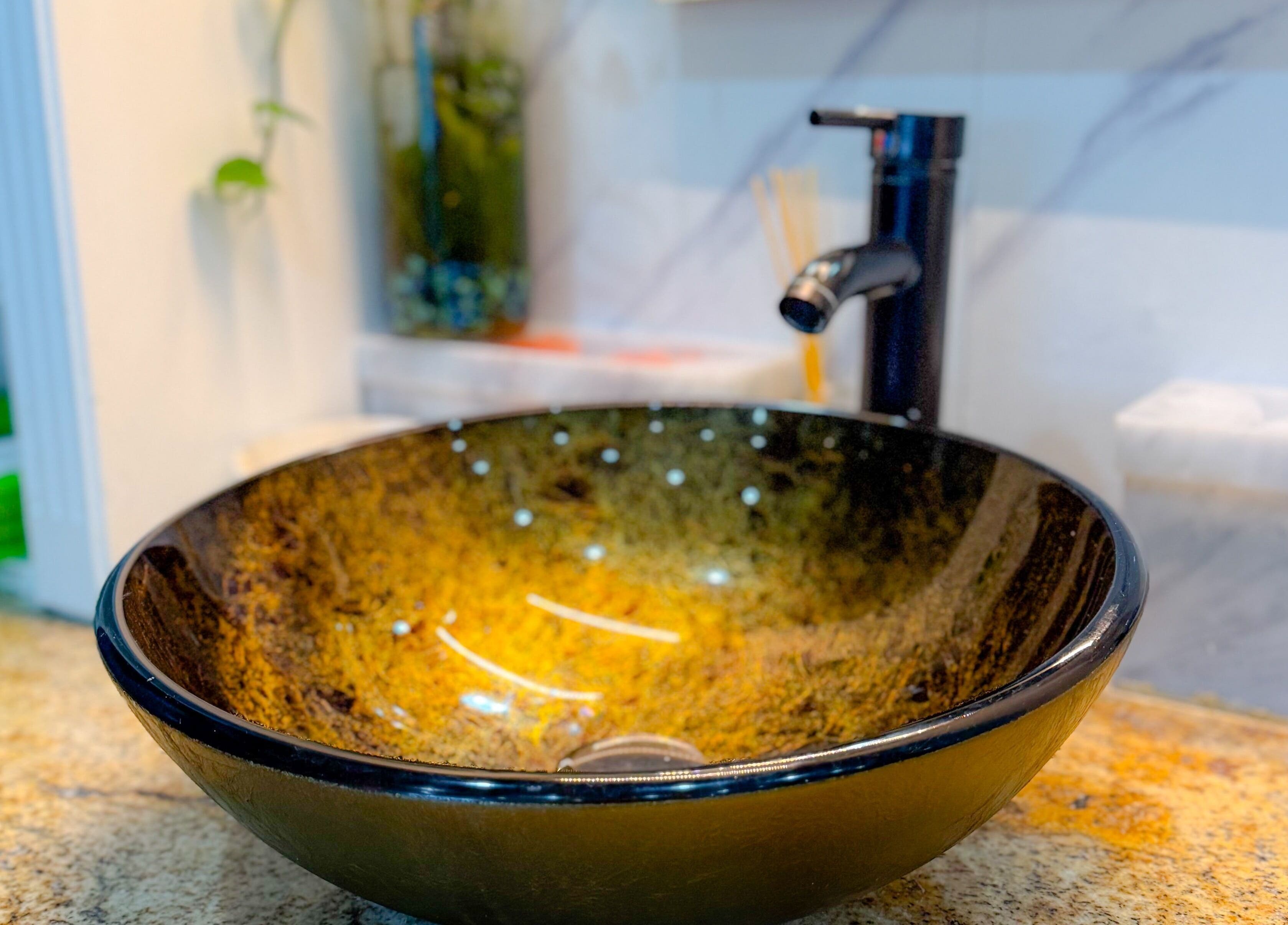 Elegant black basin at Hi-Tech Nails & Spa, St. Albert, Alberta, CA for a luxurious spa experience.