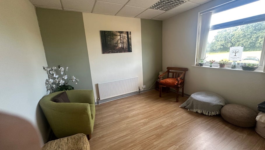 Relaxing therapy room at Redditch Therapy Centre, Redditch, England, GB, with comfy chairs and serene decor.