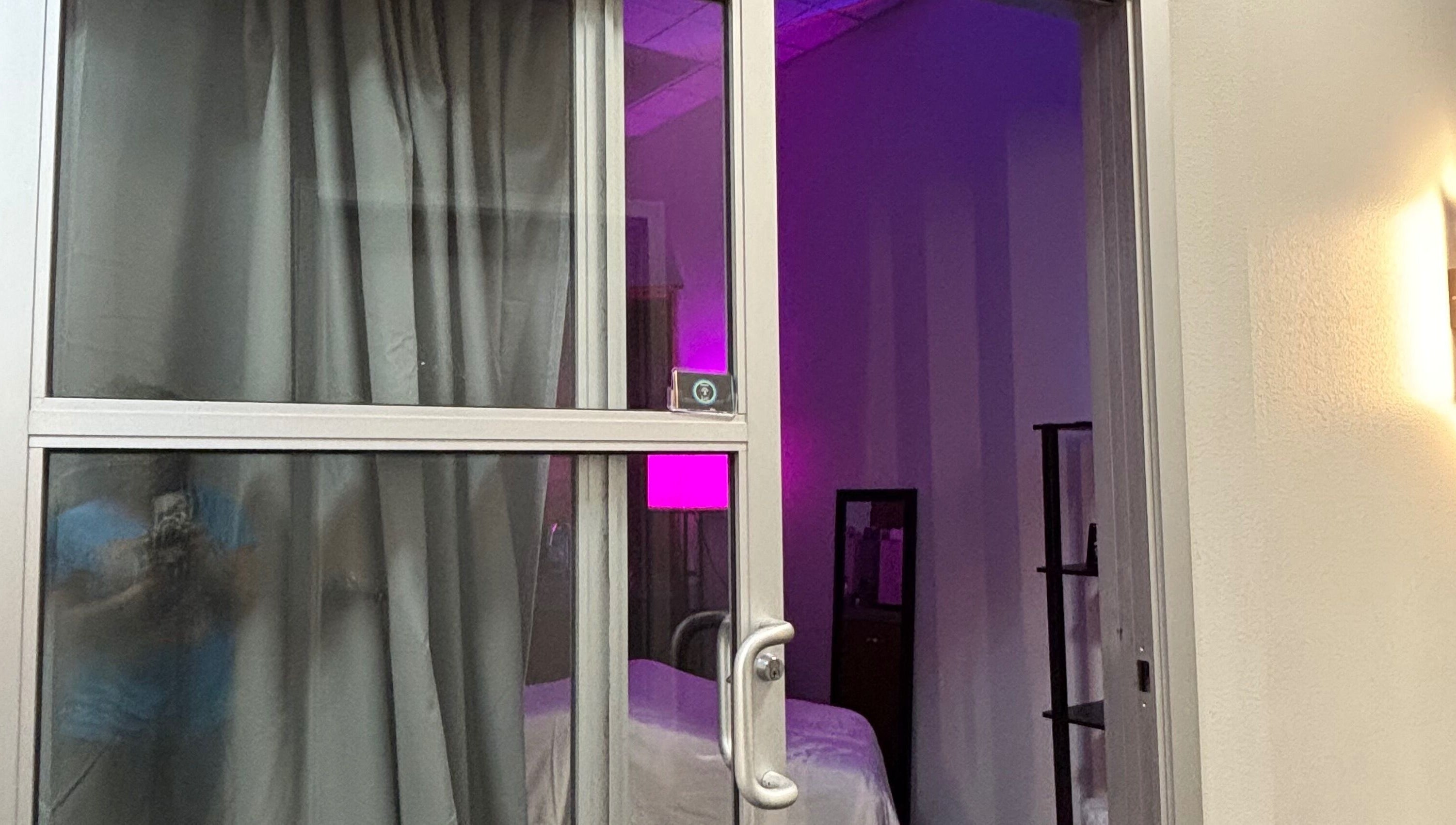 Entrance to Moore Magic Massage in North Little Rock, Arkansas, featuring a softly lit massage room.