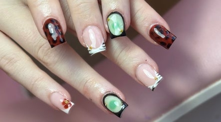 Close-up of creative nail art at The Nail Lounge, Barnsley, England, GB featuring unique designs.