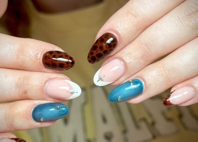 Elegant nail art at The Nail Lounge, Barnsley, England. Diverse designs showcase creativity and style.