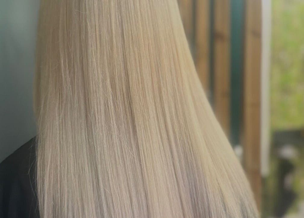 Smooth, straight blonde hair styled at Weronika Studio, Elgin, Scotland, GB.