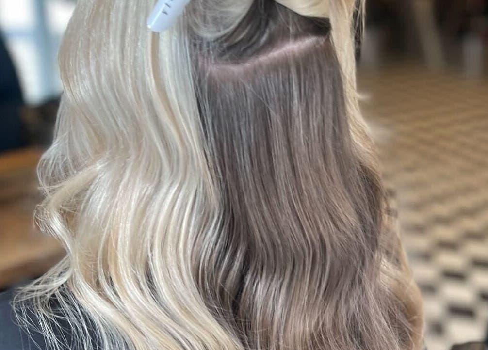 Elegant blonde hair styling at Weronika Studio in Elgin, Scotland, GB with waves and subtle highlights.