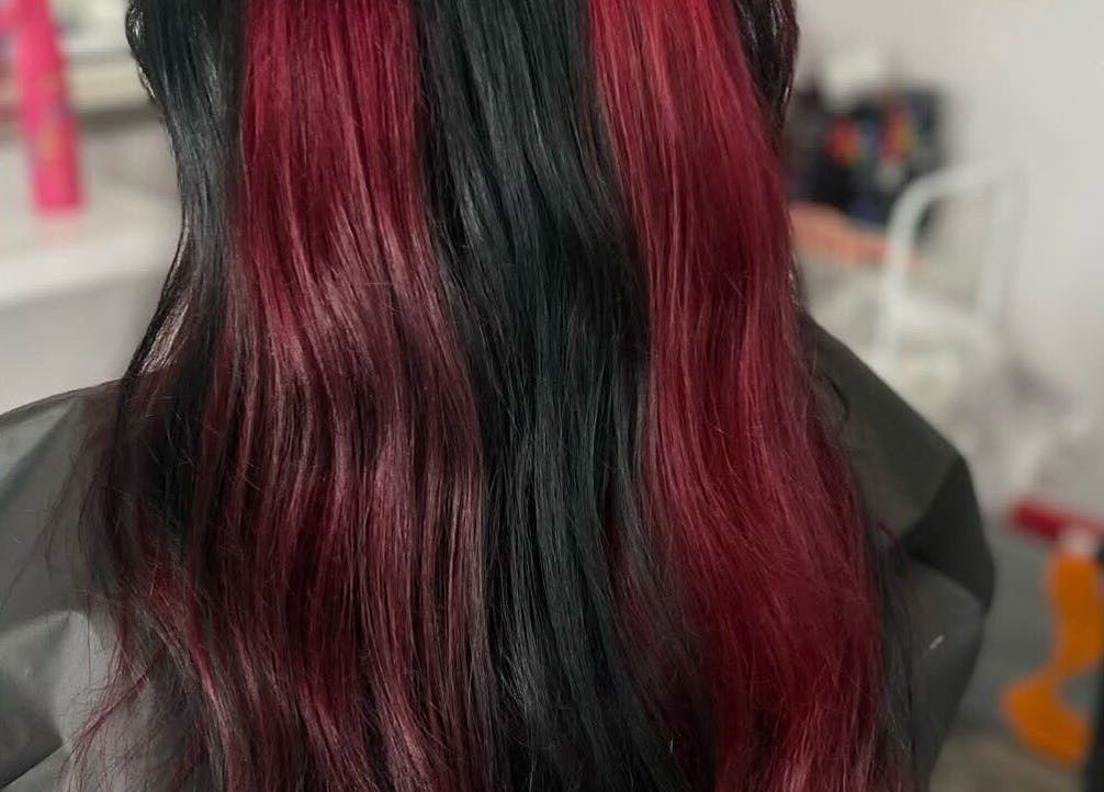 Red and black hair color styled at Weronika studio in Elgin, Scotland, GB.