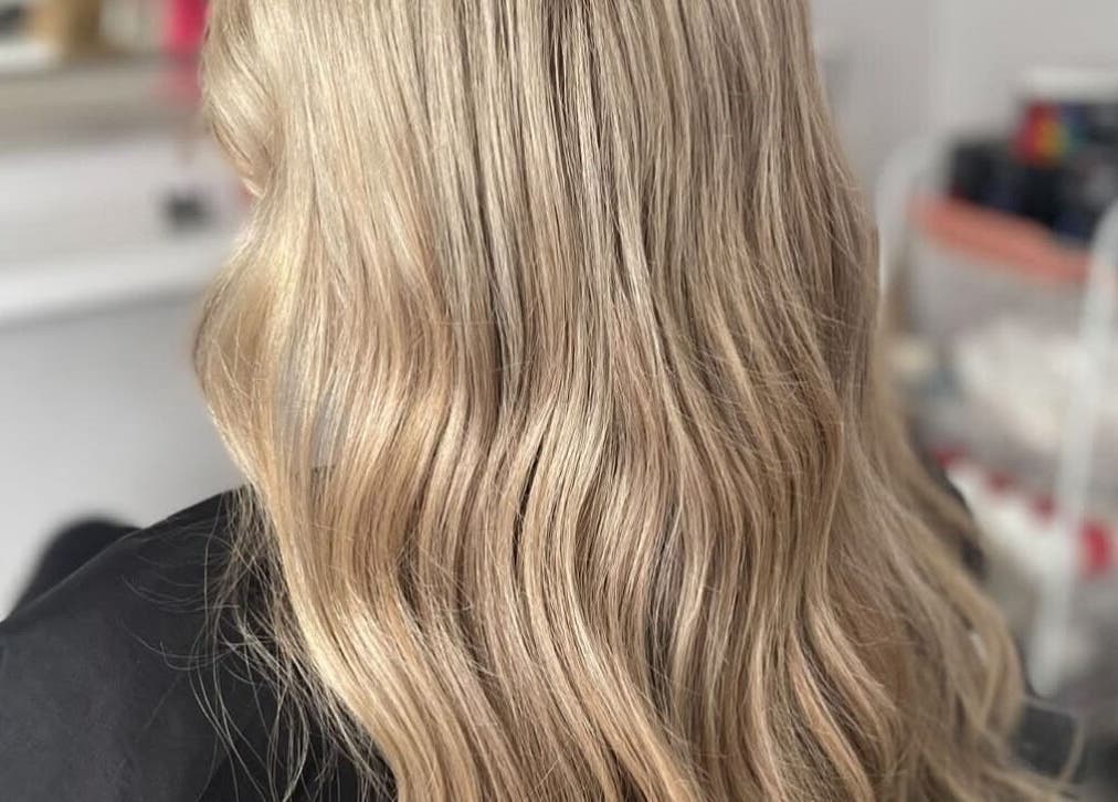 Blonde hair styled in waves at Weronika Studio, Elgin, Scotland, GB.