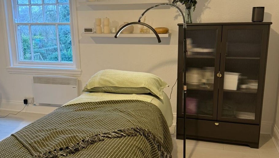 Relaxing treatment room at Synergistic Therapy in Birmingham, England, GB, featuring a cozy massage table.