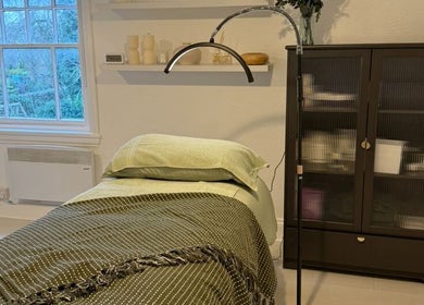Relaxing treatment room at Synergistic Therapy in Birmingham, England, GB, featuring a cozy massage table.