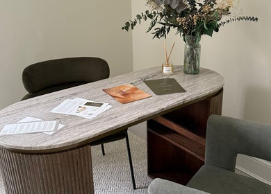 Serene office space at Synergistic Therapy, Birmingham, England with elegant decor and floral arrangement.