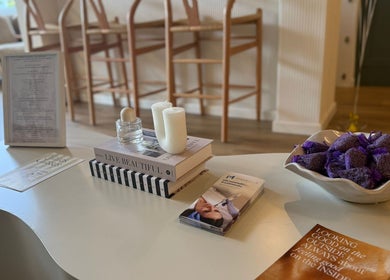 Synergistic Therapy's elegant waiting area in Birmingham, England, GB, featuring soothing decor and wellness brochures.
