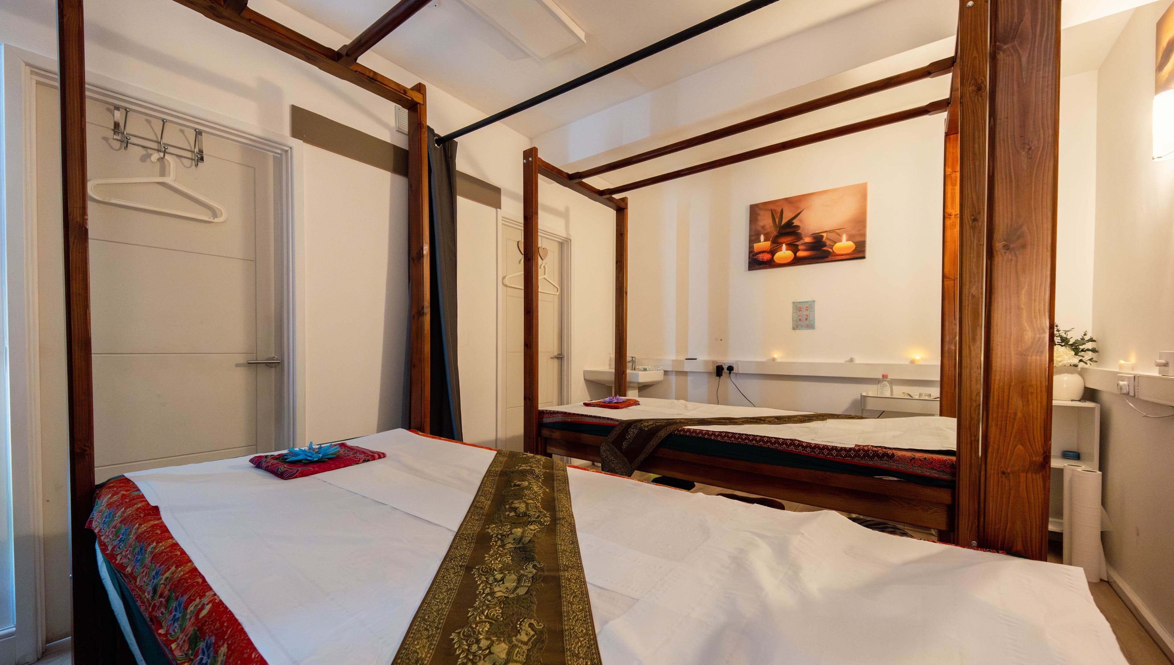 Relaxing massage room at Somchit Thai Massage and Spa in London, England, GB with elegant decor.