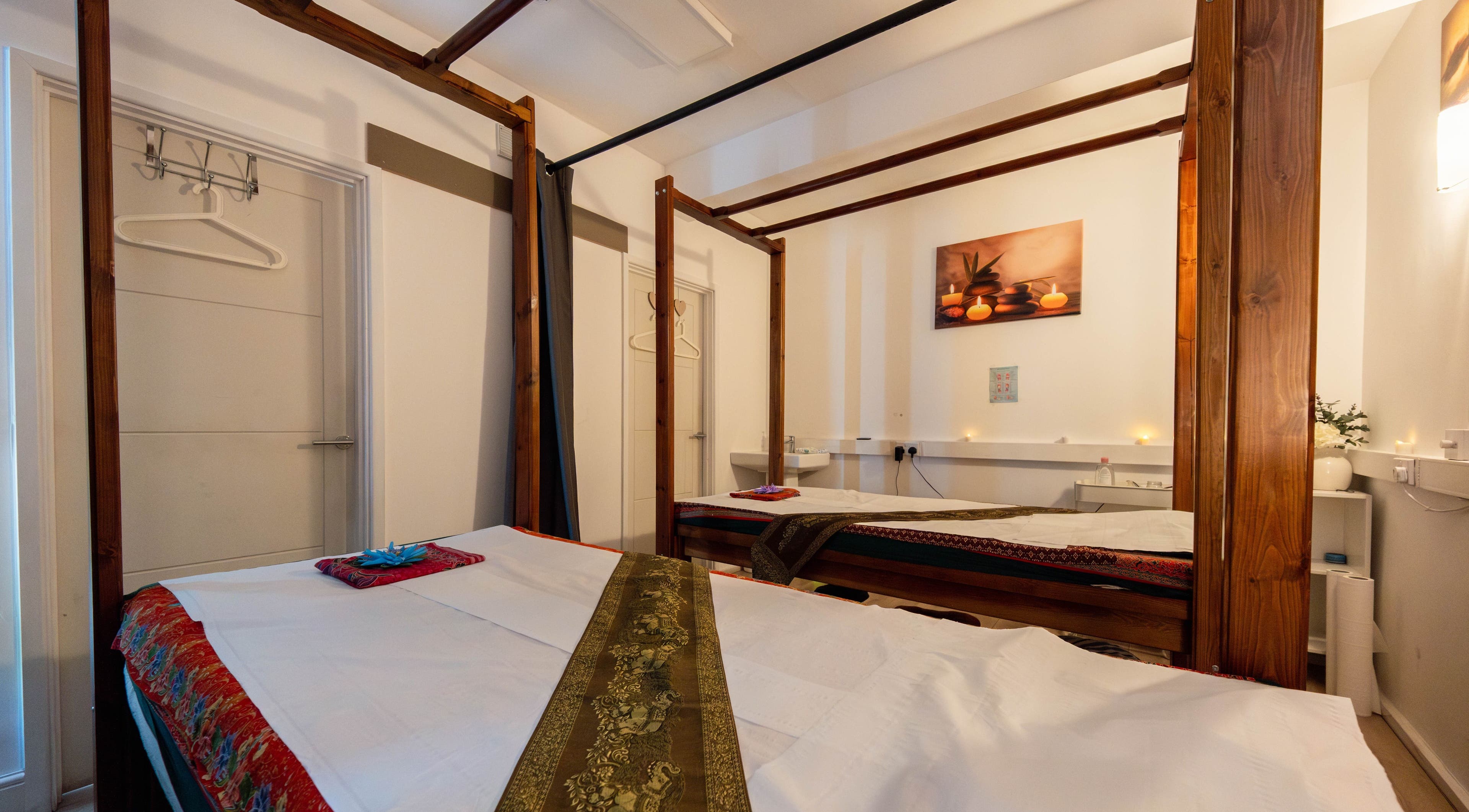 Relaxing massage room at Somchit Thai Massage and Spa in London, England, GB with elegant decor.