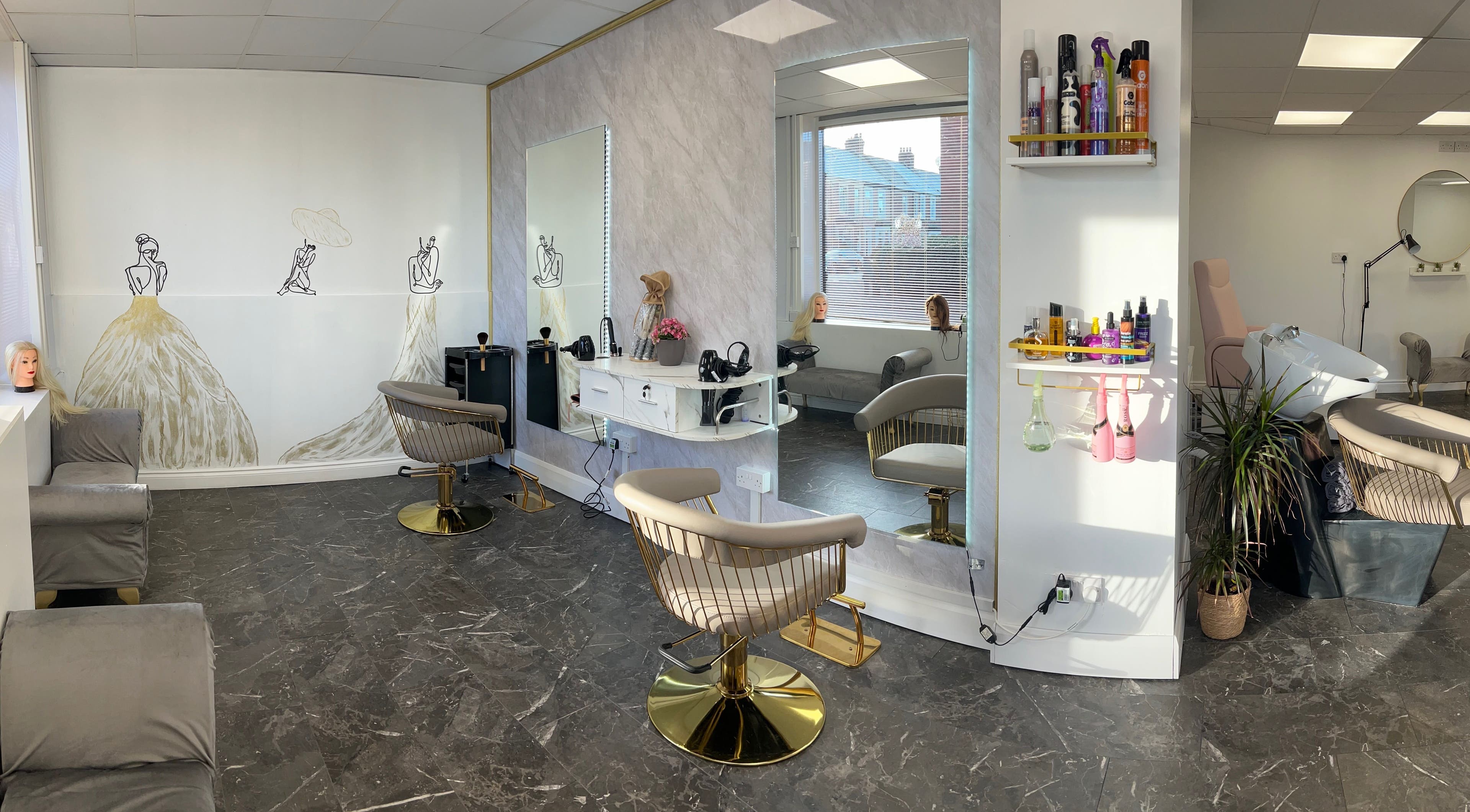 Elegant seating and decor at Besties Salon, Newcastle, England, GB, showcasing modern styling chairs and products.