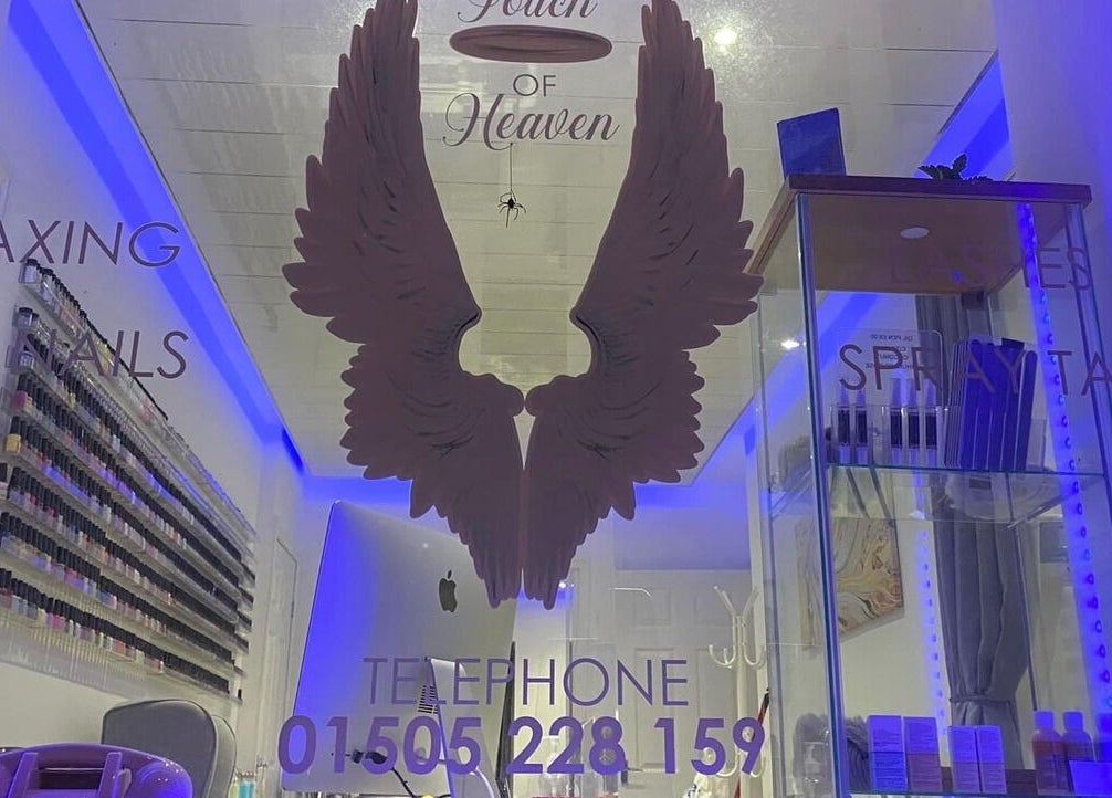 Interior of A Touch of Heaven in Kilbirnie, Scotland, GB, showcasing a vibrant beauty and wellness venue.