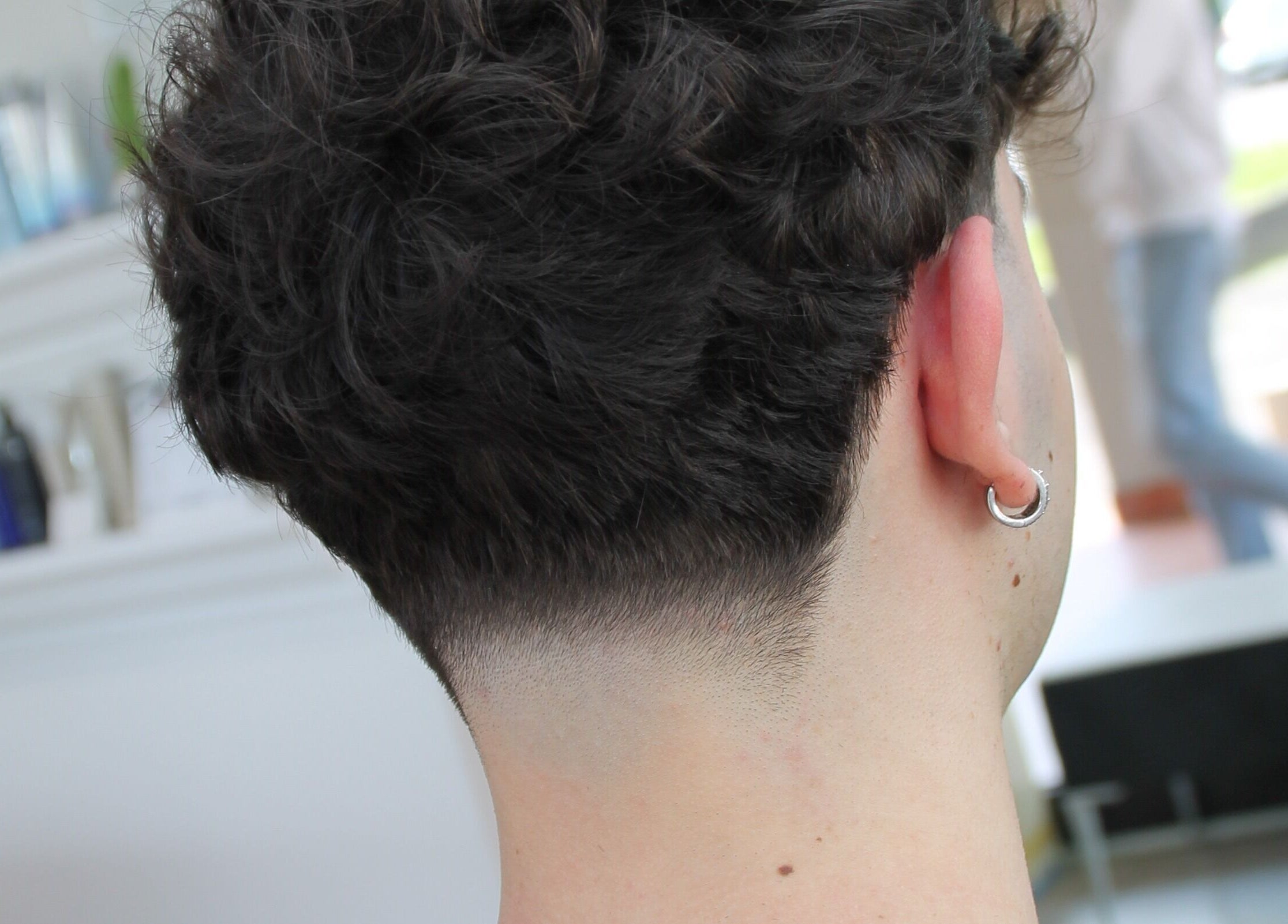 Moderna acconciatura uomo presso squizz_culture, Salzano, Veneto, IT, ideale per un look raffinato.