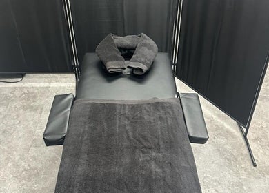 Relaxing treatment bed at A.J.Healing, South Ockendon, England, GB, offering tranquility and wellness.
