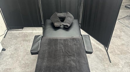 Relaxing treatment bed at A.J.Healing, South Ockendon, England, GB, offering tranquility and wellness.