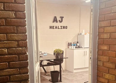 Entrance view of A.J.Healing in South Ockendon, England, GB showcasing a cozy interior.
