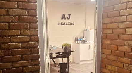 Entrance view of A.J.Healing in South Ockendon, England, GB showcasing a cozy interior.