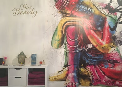 Colorful Buddha mural at True Beauty, Forfar, Scotland, GB with vibrant decor enhancing a peaceful ambiance.