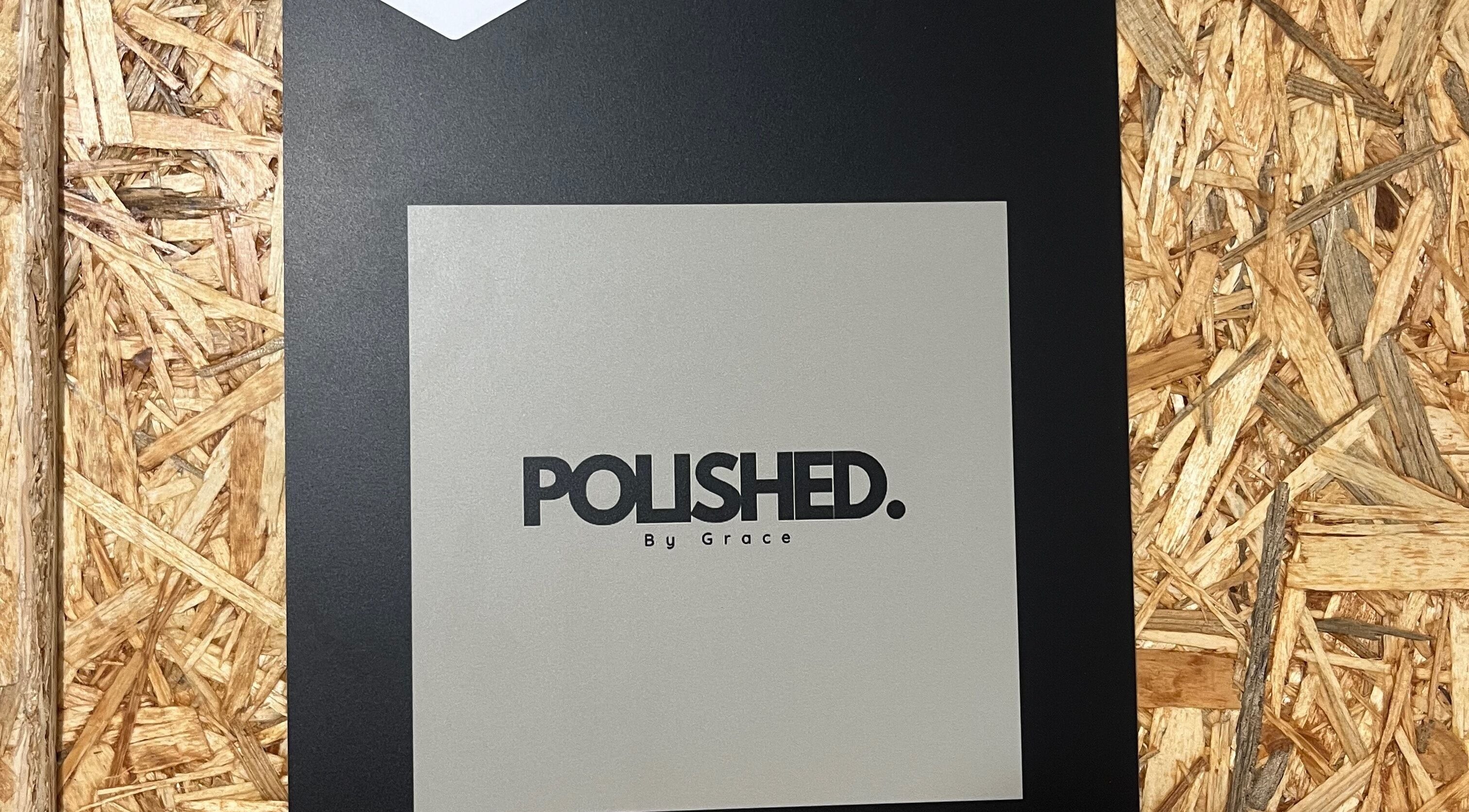 Signage of Polished by Grace in Barnsley, England, GB featuring elegant logo on wood and black panel background.