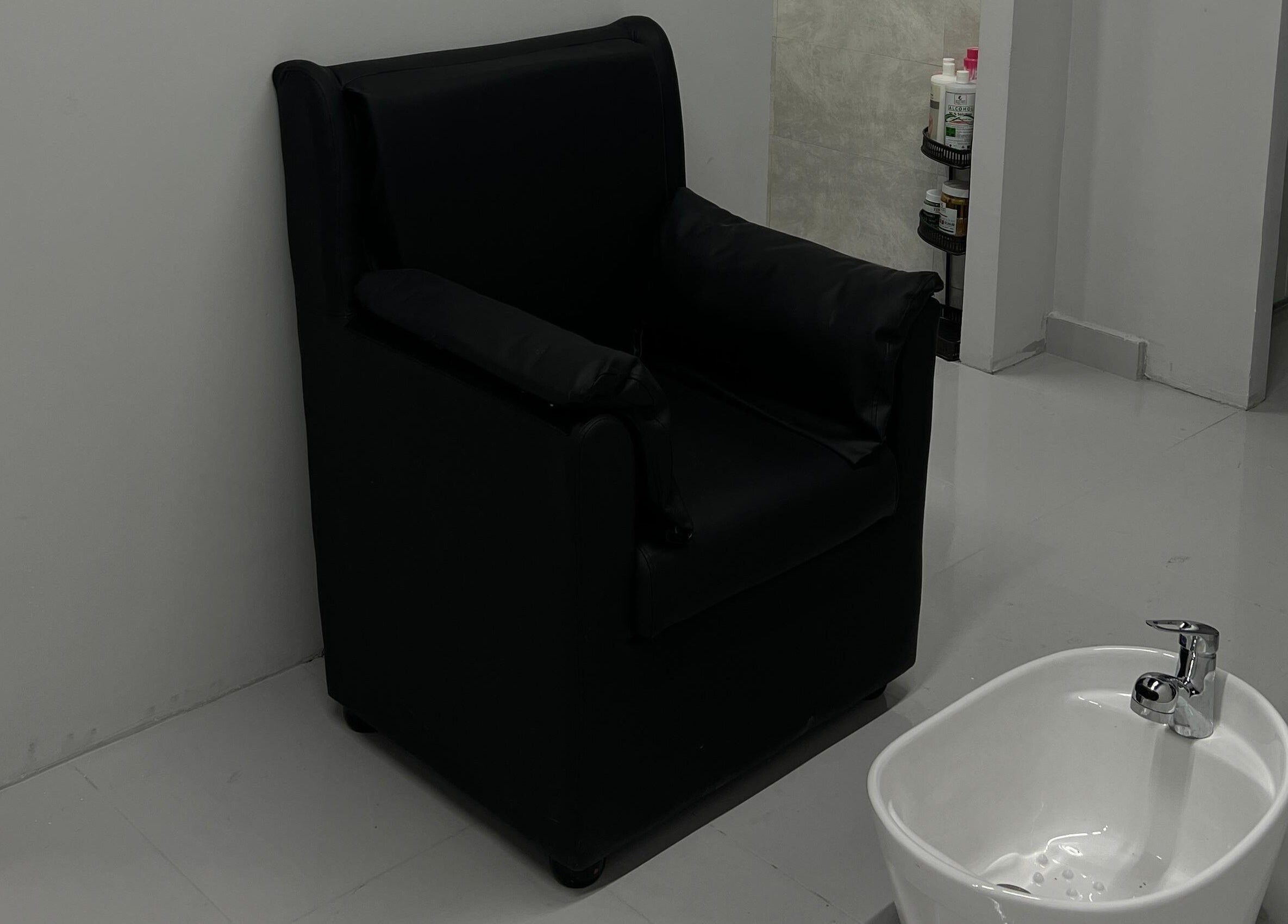 Comfortable black pedicure chair at The Barber Lab, Sharjah, Sharjah, AE, enhances wellness experience.