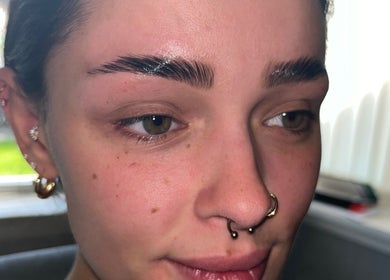 Perfectly sculpted eyebrows at Brow It Up, Stenhousemuir, Scotland, GB.