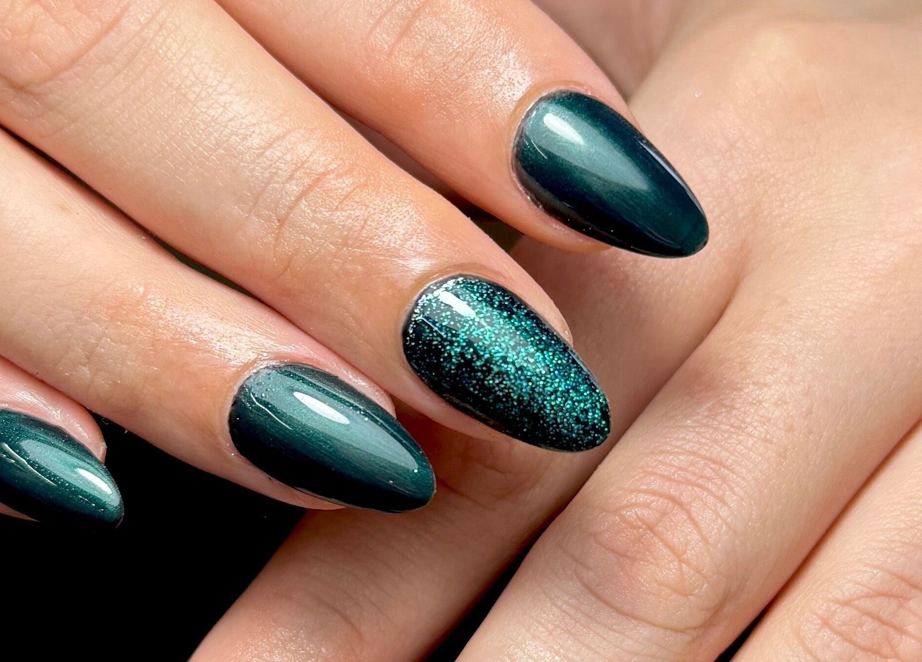 Stunning emerald nail art at Polished by Kate, Constantine, England, GB, showcasing expert craftsmanship.